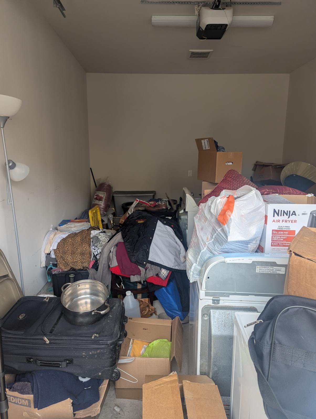 Packed storage room estate cleanout Seattle